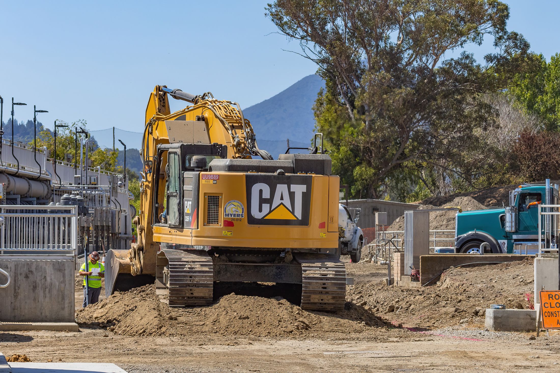 Heavy machinery working on an active industrial construction site